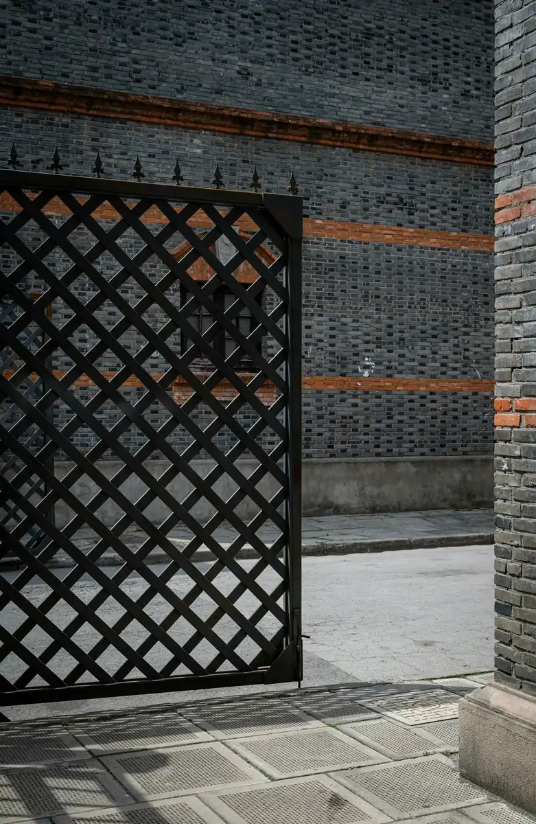 Entry Gates Louisville, KY, modern black gate opening onto a street