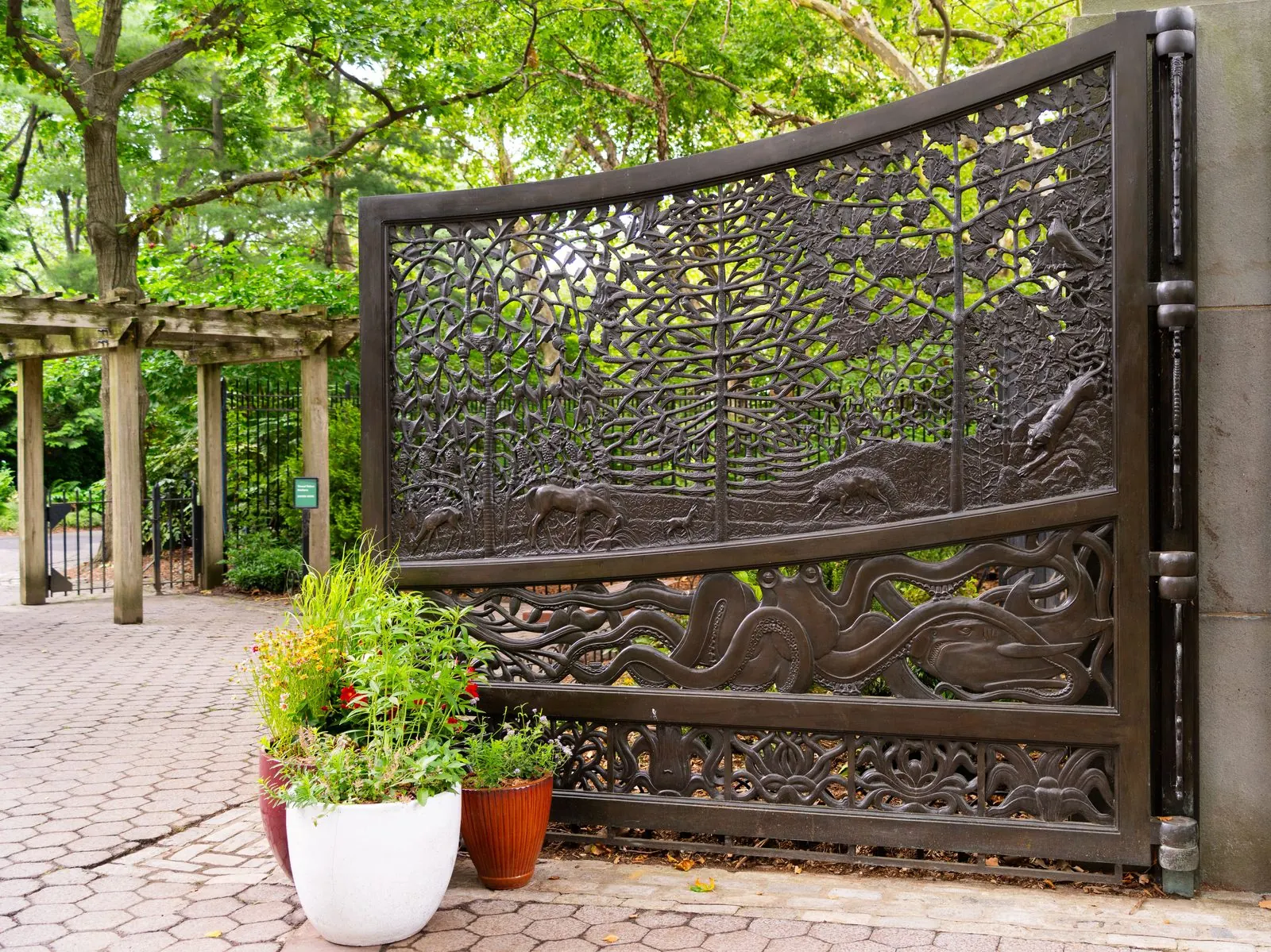Side Yard Gates Louisville, KY, custom ornamental wrought iron gate with nature relief scrollwork